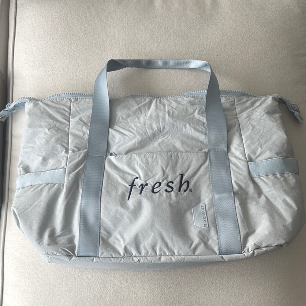 Fresh Gray Travel Bag with Quilted Texture